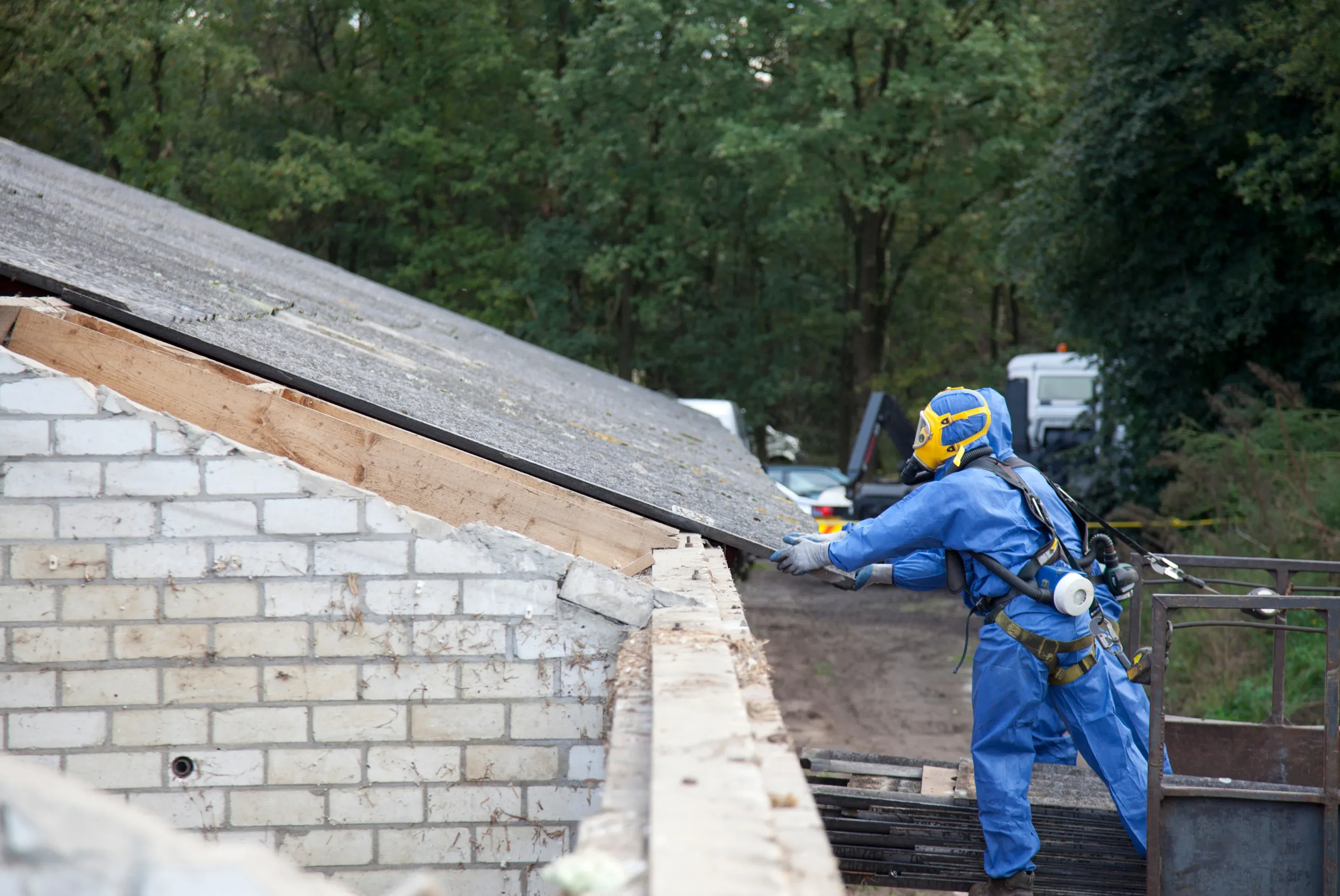 Licensed contractor performing asbestos roof removal in Canberra