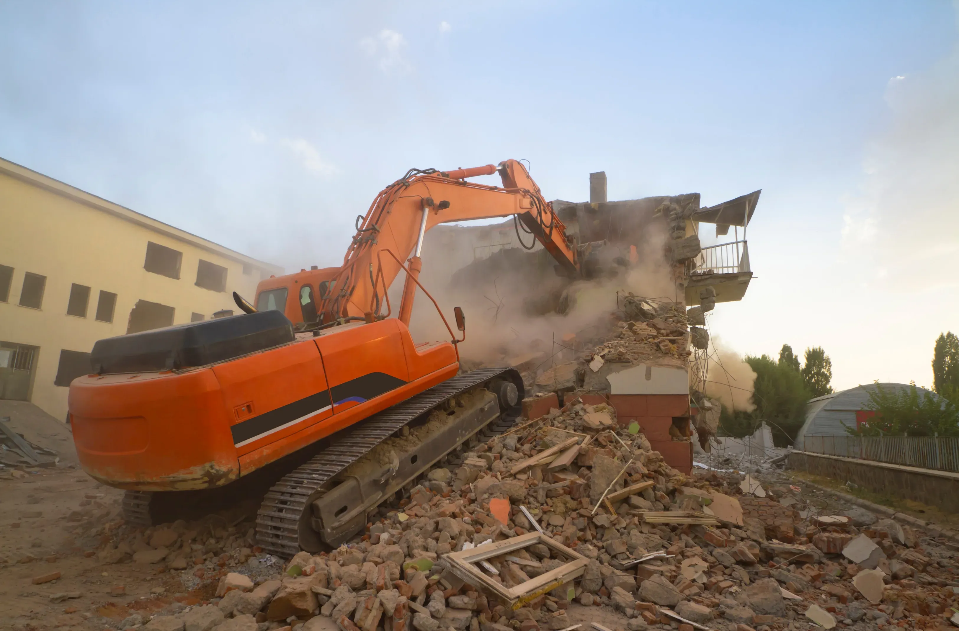 Licensed demolition contractor clearing a building site near Perth